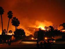 Wildfires burn out of control in southern California (Sean Ward/www.cnn.com)