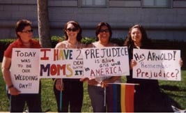 Natalie Sanchez and Nashyra Kiesel protest the ban on gay marriage with their mothers (hope bastian/guilfordian)