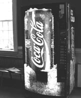 A ravaged coke machine broods, a victim of stupidity (Rob Burman/Guilfordian)
