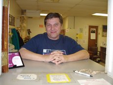 Paul Johnson oversees the student mail room in the basement of Founders ()