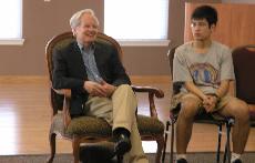 Junior Matt Haselton sat beside Bill Moyers at a small group talk. (Josh Cohen)