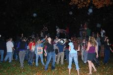 students march in celebration around campus. (Mara Karell)