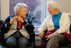 Peggy Baxter (right) sits with Jewell Farlow as they reminisce about their years at Guilford. The Mary Hobbs Reunion took place April 17 through 19, providing a weekend of joyous reconnection for alumnae. ()