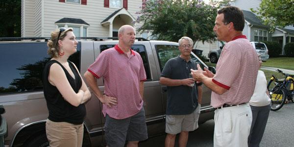 Newly elected mayor Robbie Perkins (right) discusses his plans with Greensboro citizens. His winning platform focused on economic development and public safety.  (www.robbieperkins.com)