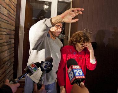 Paterno and his wife on their front porch as they answer questions from the press (The Patriot News)