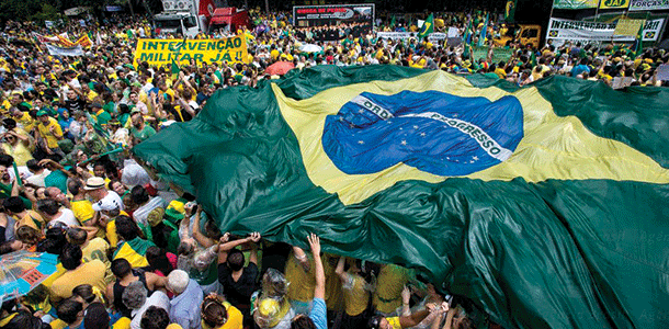 Protesters in Sao Paulo held a large Brazilian flag and called for the impeachment of Brazilian President Dilma Rouseff. 