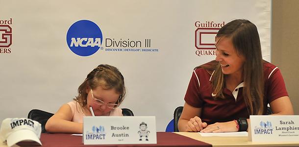 Brooke Austin is the newest -- and youngest -- member of Guilfords womens lacrosse team. Austin officially signed on October 7. She and her family will continue to be members of the Guilford community moving forward. 