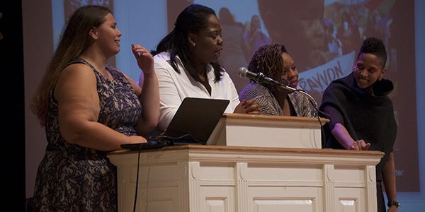 Senior Teresa Bedzigui and junior Brandee Craig stand with Patrisse Cullors and Janaya "Future" Khan.