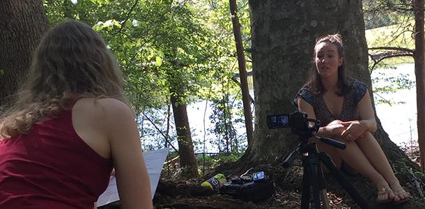 Junior Hannah Brewer-Jensen interviews senior Kelsey Ruehling on camera for the Cape Fear River Basin Studies Program documentary.