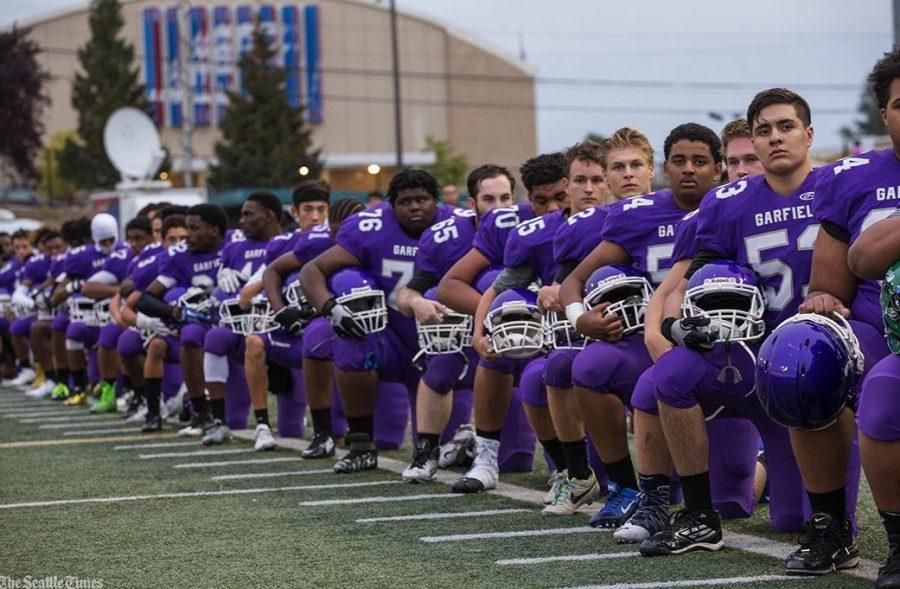 Athletes kneel down to protest against injustice