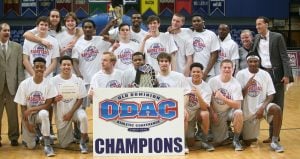 Guilford College mens basketball team poses after winning the ODAC Tournament. Photo By Andrew Walker 2017