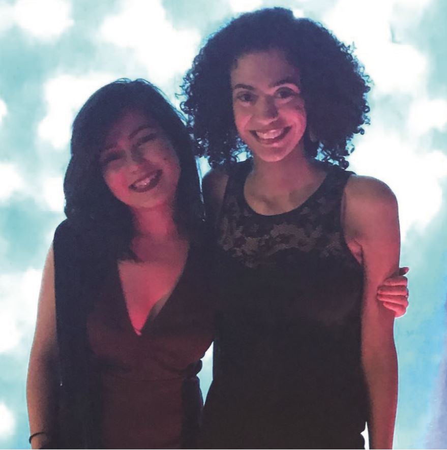 Hadis Daqiq ’19 and Chloe Williams ’17 pose in front of a backdrop during the Lumos Charity Yule Ball. Organized by the Quidditch team, the event raised money for the Lumos Foundation