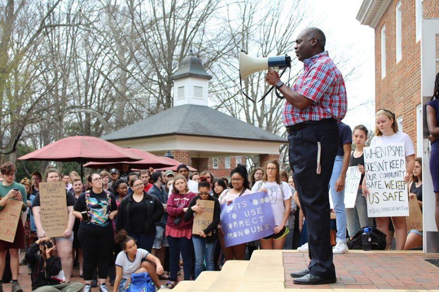 Director of Public Safety William Anderson addresses the crowd of students at the speak-out in front of Founders Hall.