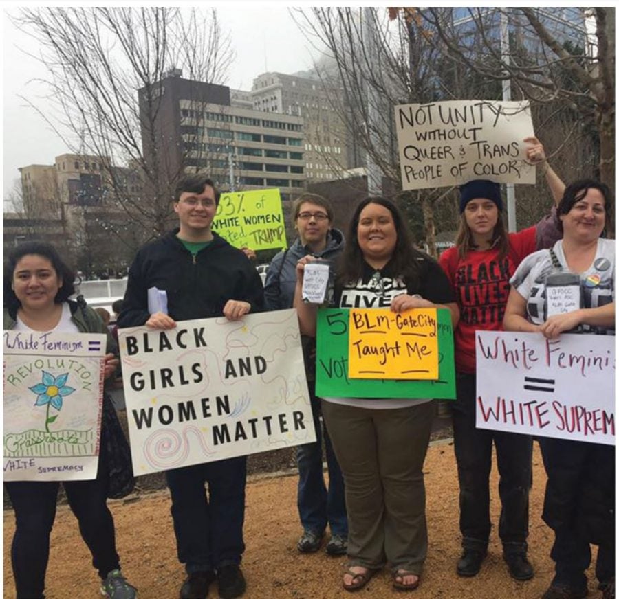 Supporters and allies of the Black Lives Matter movement collect money for queer and trans women of color during the “A Day
Without Women” protest that took place on Wednesday, March 8, in Greensboro, North Carolina. // Photo courtesy of Valeria Sosa