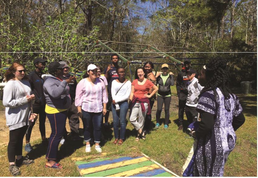 First-year Bonner Scholars learn about the history and culture of the Gullah/Geechee tribe as they listen to Queen Quet. They engaged in volunteer service at the Gullah/Geechee Sea Island Coalition, South Carolina this past spring break. // Photo courtesy of James Shields.