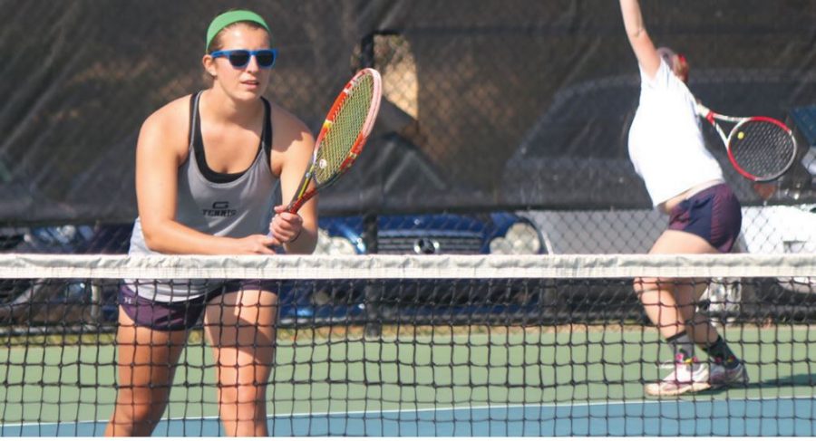 Katie Claggett ’19, practices before beginning the tennis season after winning against Emory and Henry. // Photo by Ava Nadel/Guilfordian