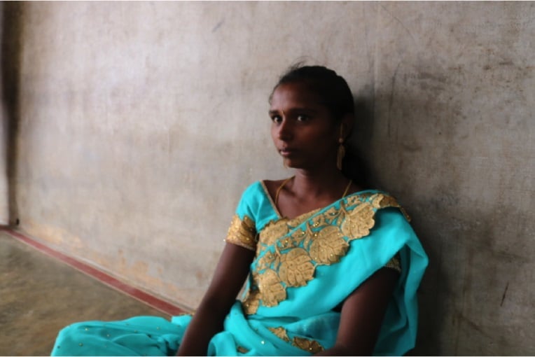 Ramya, who married her uncle at age 14, in her home in Athimoor. Image by Praveena Somasundaram. India, 2017. Pulitzer Center.