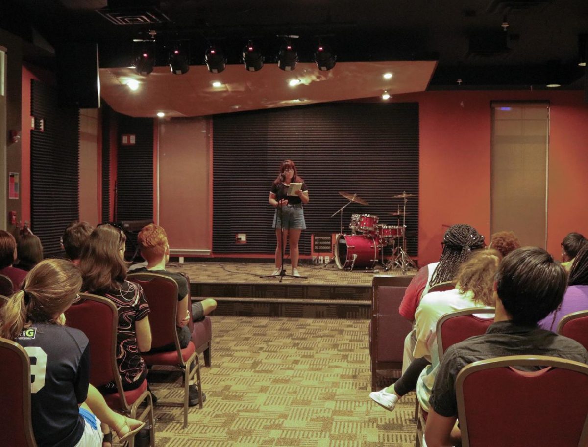 Lesly Vasquez ‘18 performs “Photograph” by Andrea Gibson during the poetry slam in the Community Center on Thursday, Sept. 21, 2017./Photo by Abigail Bekele/The Guilfordian