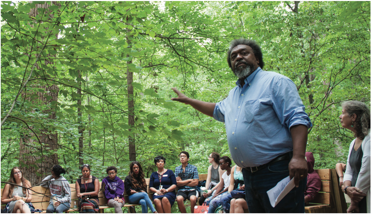 James+Shields+%E2%80%9900%2C+Director+of+the+Bonner+Center+for+Community+Service+%26+Learning%2C+explains+the+significance+of+the+Underground+Railroad+Tree%2C+a+300-year+old+poplar+tree+located+deep+in+the+college%E2%80%99s+woods.%2F%2FPhoto+by+Fernando+Jimenez%2FThe+Guilfordian