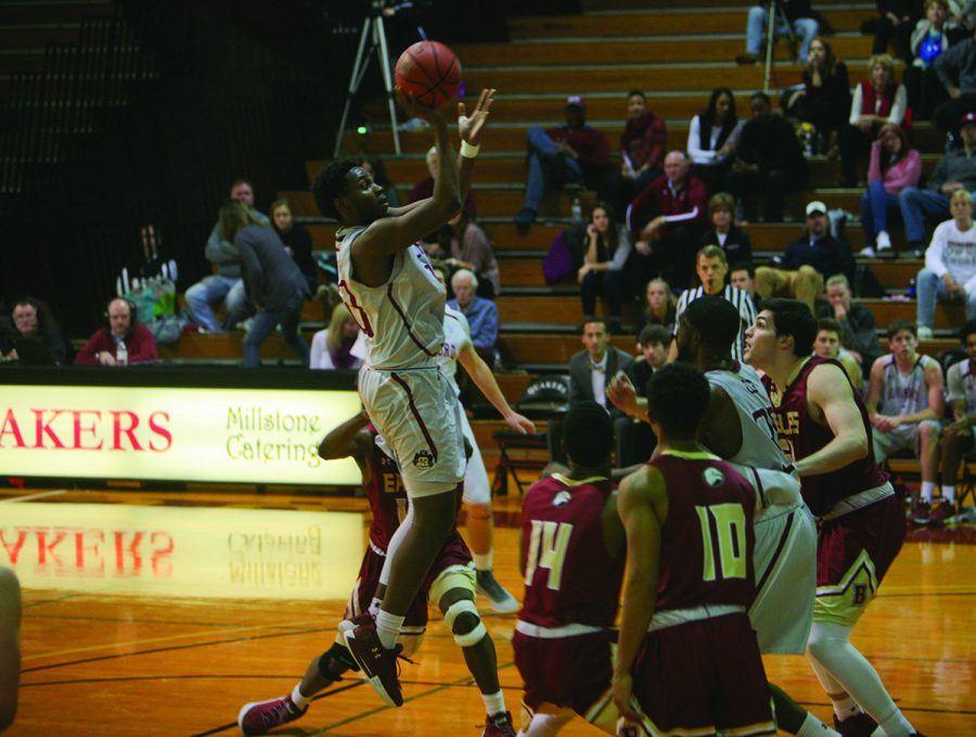 Junior forward Marcus Curry attempts a floater against Bridgewater College on Saturday, January 13, 2018 in the Ragan-Brown Field House. Curry scored nine points in the 67-66 loss to the Eagles. // Photo By Andrew Walker/The Guilfordian