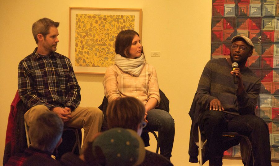 Charlie Tefft (left), Katy Collier and Antoine Williams discuss building a career in their field and the struggles they face in their work in the Hege Library Art Gallery on Wednesday, Jan. 28, 2018.//Photo by Ezra Weiss/The Guilfordian
