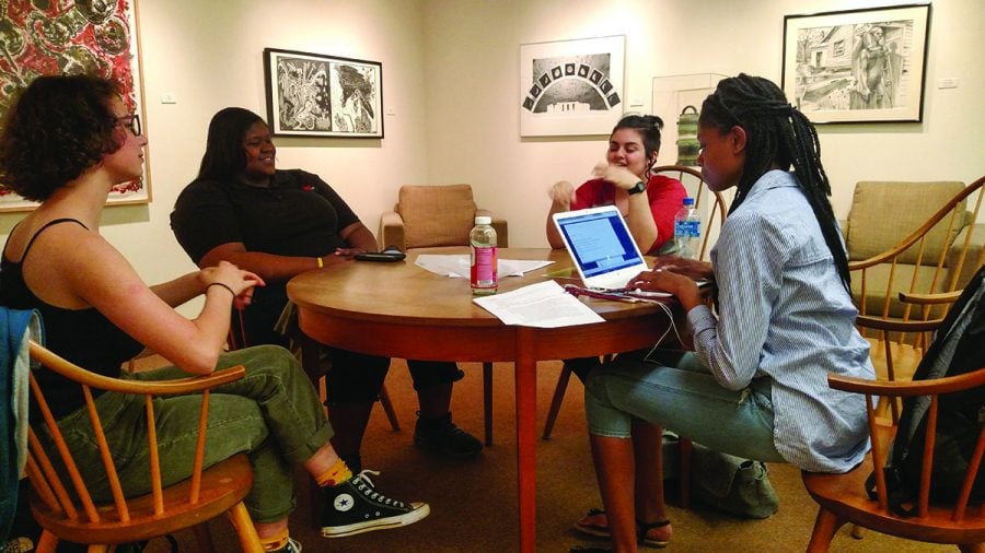 Members of Green Society discuss ways to make Guilford College the first carbon neutral college in the American south during a meeting. Photo courtesy of Matt Armstrong