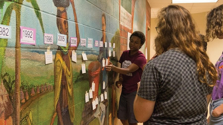 Senior Olivia Winder participates in an interactive timeline activity that explores legislation affecting the immigrant community. This activity was part of the UndocuAlly training that took place on Monday, Oct. 1 in King Hall. // Photo By: Fernando Jiménez/The Guilfordian
