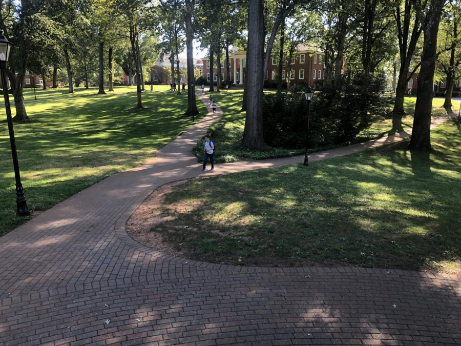 Students walk across Guilfords quad in September 2019.