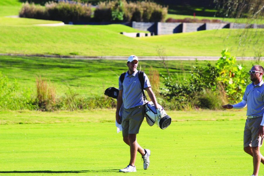 Junior Louis Lambert strolls down the fairway. // Photo by Trey Kawugule // The Guilfordian