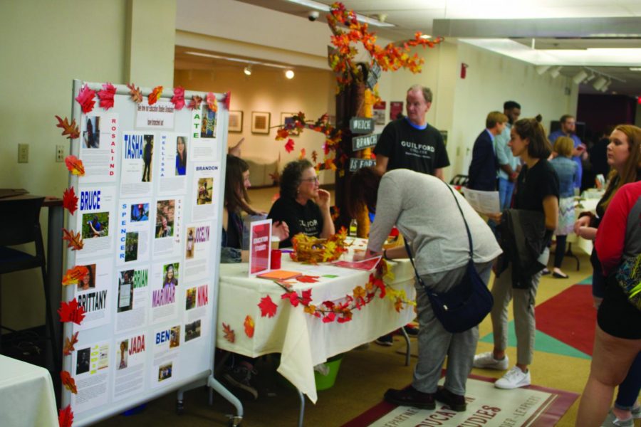 Students line up at the Education Studies table to learn more about what the major has to offer.