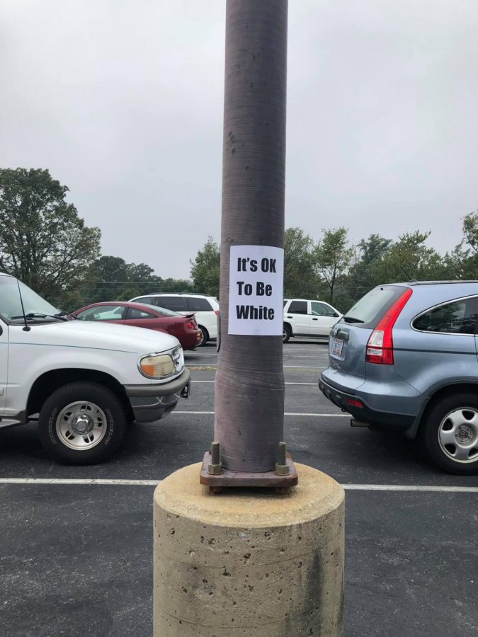 Posters saying, Its OK to Be White were placed in multiple locations around campus.