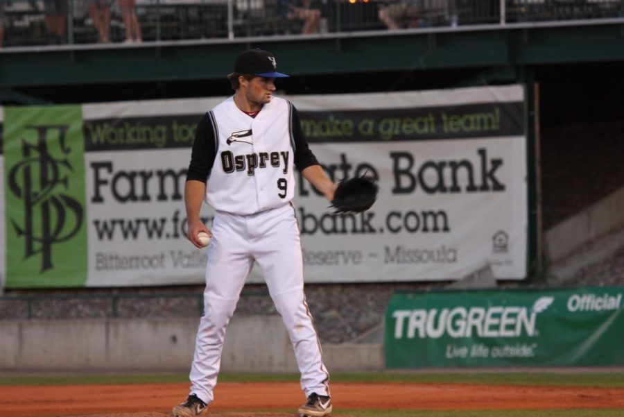 Guilford alumnus Mitchell Stumpo stares down a batter at a game