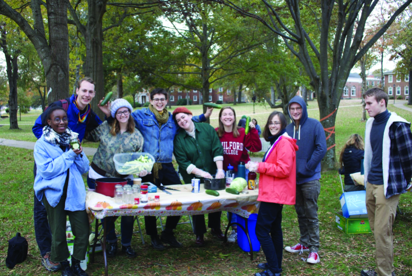 Guilford College Co-op hosts pickle making station for the fall festival.