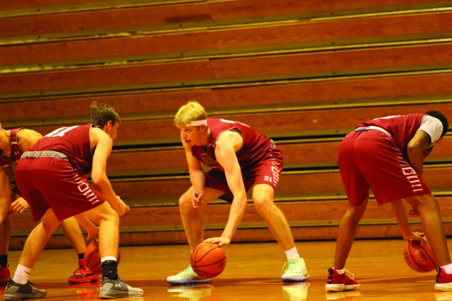 Sophomore+Liam+Ward+practicing+his+dribbling+skills+in+a+preseason+practice.+