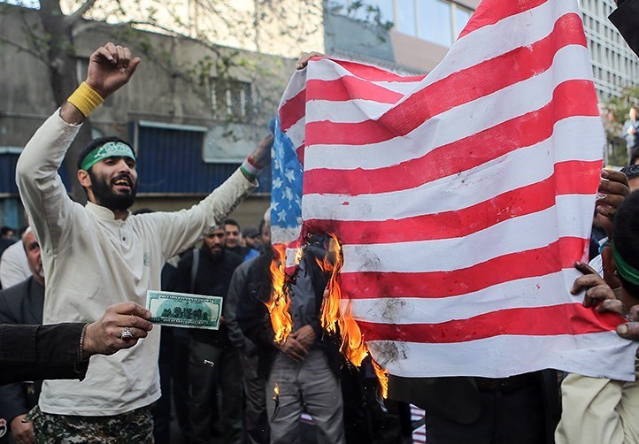 A group of Iranian protestors burned the American flag in 2017 as part of a demonstration marking the anniversary of the 1979 takeover of the American Embassy.