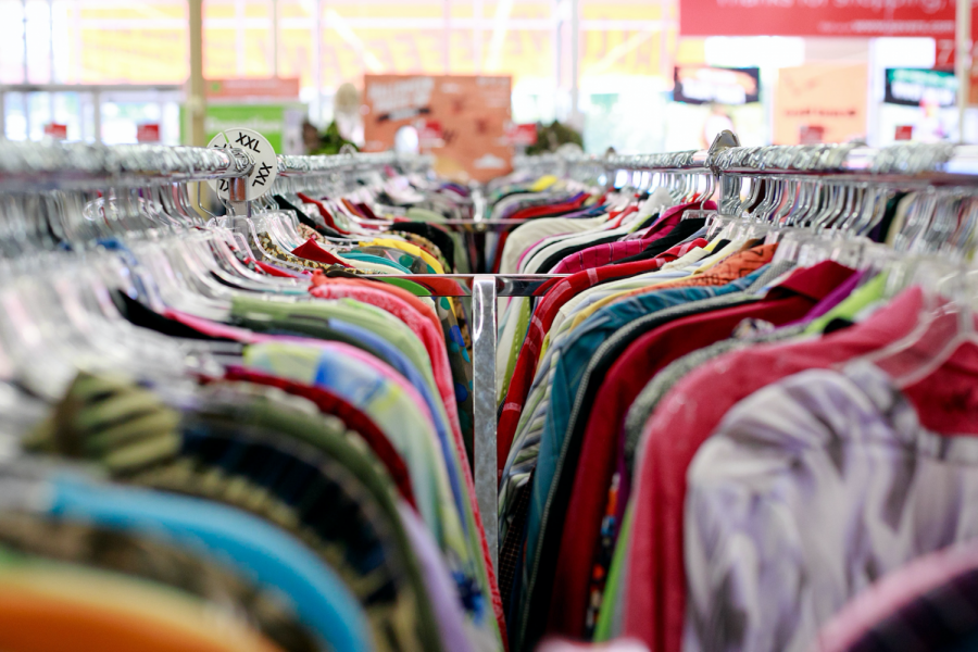 A clothing rack at a thrift store.