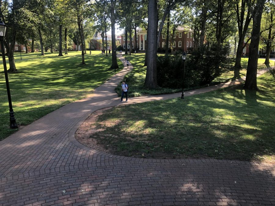 Students walk across Guilfords quad in September 2019