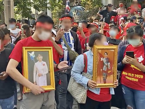 Protesters in Bangkok, Thailand take a stand against the military turmoil between the NLD and military forces.