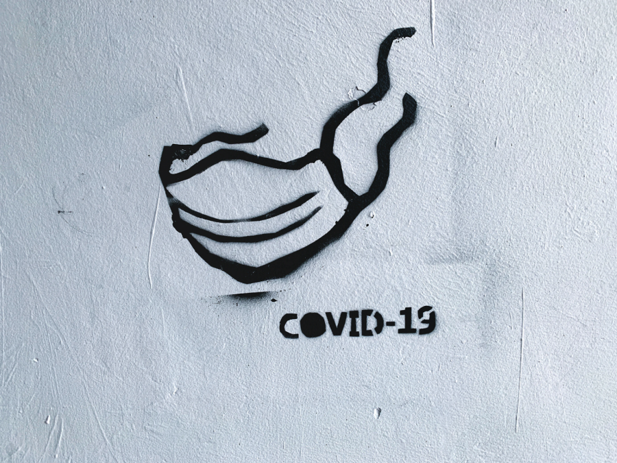 Street art advocating for masks during the COVID-19 pandemic.
