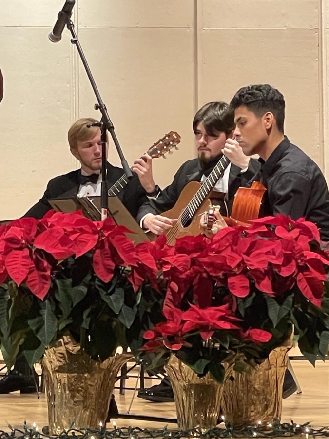 Members of the Guilford College Guitar Ensemble prepare to perform during the Colleges holiday concert in Dana Auditorium on Dec. 6. 