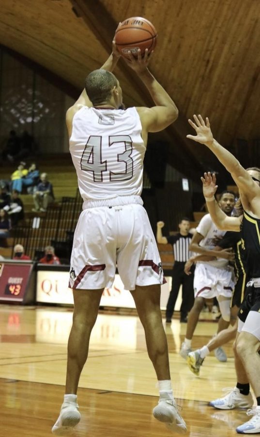 Jason Foulks drains a short jumper in a game against Randolph College on December 1, 2021, at Guilford College.     

