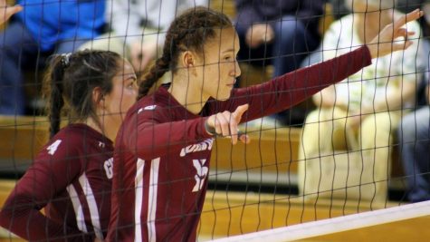 Middle-back Vanessa Johnson watches the ball waiting for a serve from the Generals.
