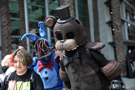 FNAF fans bringing the world to life long before it hits the big screen can’t wait to see what happens next!
https://commons.wikimedia.org/wiki/File:Five_Nights_at_Freddy%27s_cosplayers_(51985441110).jpg