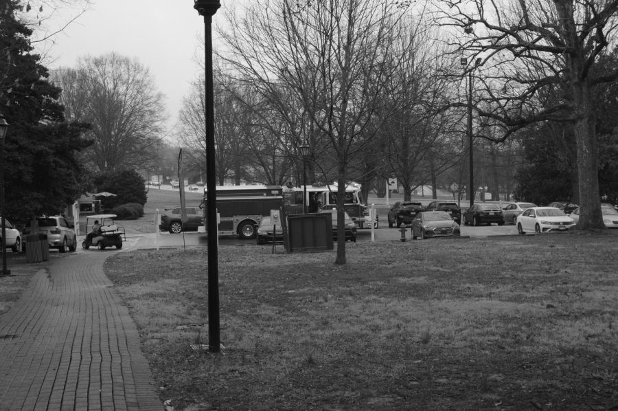 A fire engine leaves campus following power outage. 