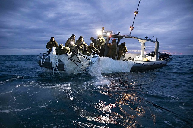 U.S. Navy sailors assigned to Explosive Ordnance Disposal Group 2 recover a high-altitude surveillance balloon off the coast of Myrtle Beach, South Carolina, on Feb. 5, 2023.