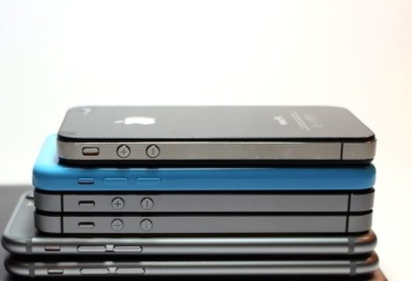 Stacked Apple devices, from newest on the bottom to oldest on the top.