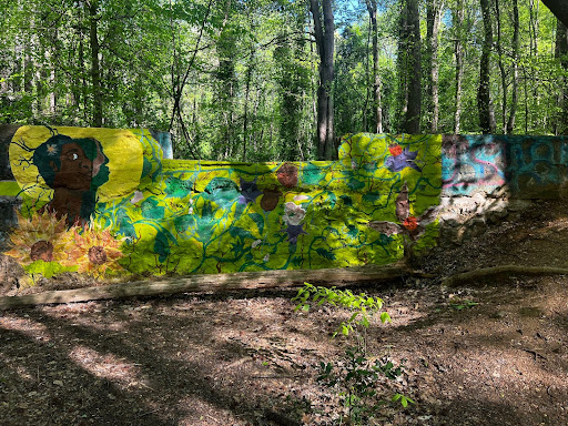 Within the thick of the Underground Railroad trail lies a symbolically painted mural.